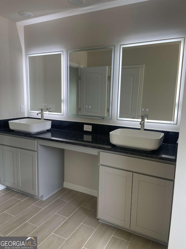 124 Shenandoah Ln, Lagrange, GA 30241 - bathroom featuring a sink and double vanity