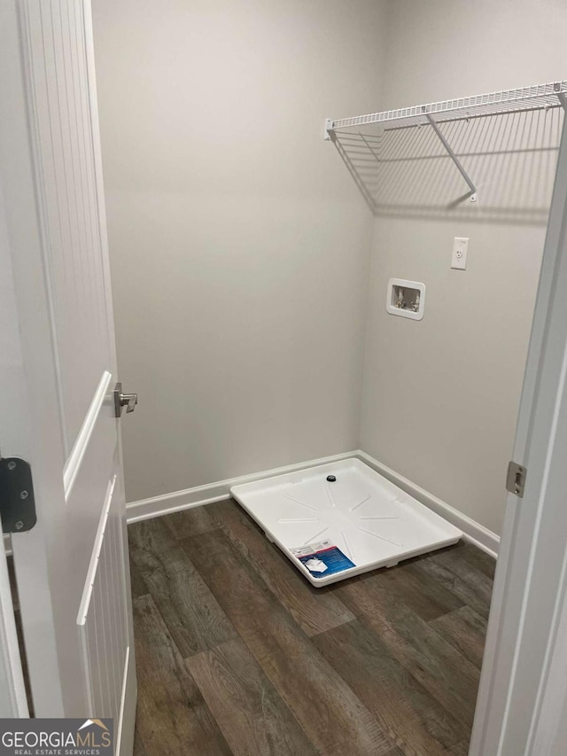 124 Shenandoah Ln, Lagrange, GA 30241 - washroom with dark wood finished floors, hookup for a washing machine, baseboards, and laundry area