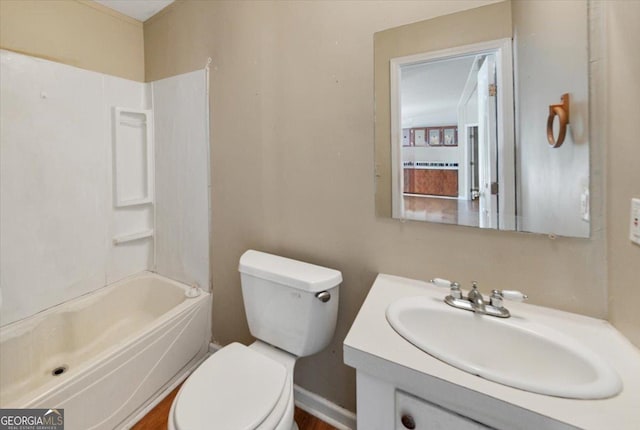 full bath with toilet, vanity, and shower / tub combination