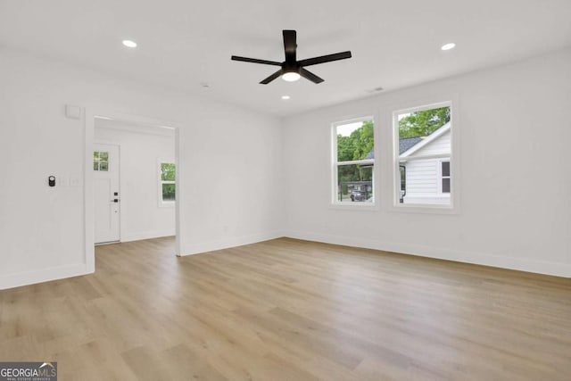 unfurnished room featuring light wood-type flooring, baseboards, recessed lighting, and ceiling fan