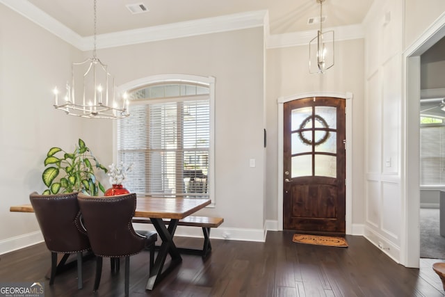 906 Abingdon Cv, Bonaire, GA 31005 - foyer entrance with a chandelier, dark wood-style flooring, healthy amount of natural light, and crown molding