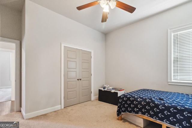 906 Abingdon Cv, Bonaire, GA 31005 - carpeted bedroom with a ceiling fan and baseboards