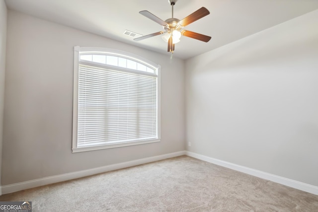 906 Abingdon Cv, Bonaire, GA 31005 - spare room featuring carpet flooring and a ceiling fan