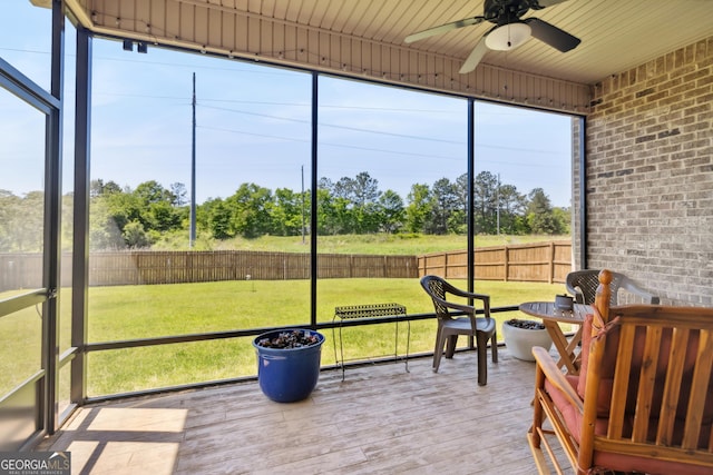 906 Abingdon Cv, Bonaire, GA 31005 - sunroom / solarium with a ceiling fan and an outdoor fire pit
