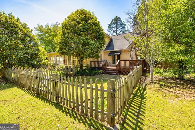 view of yard featuring a deck