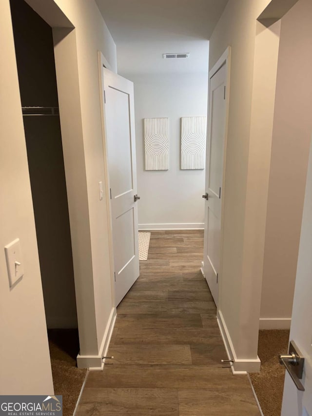 719 Windstream Dr Unit B61, Lagrange, GA 30241 - hall featuring visible vents, wood finished floors, and baseboards