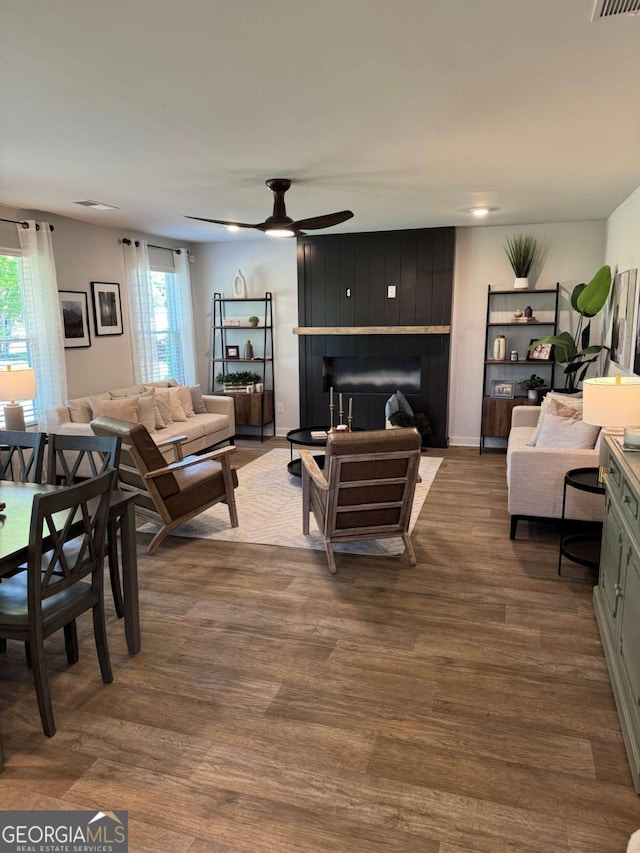 719 Windstream Dr Unit B61, Lagrange, GA 30241 - living area featuring a ceiling fan, a wealth of natural light, a fireplace, and wood finished floors