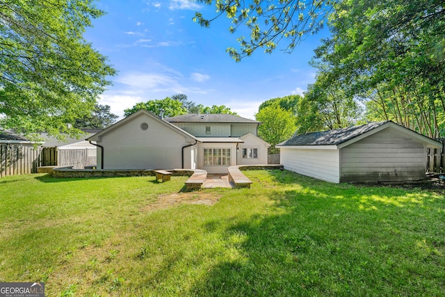 back of house featuring a patio area and french doors