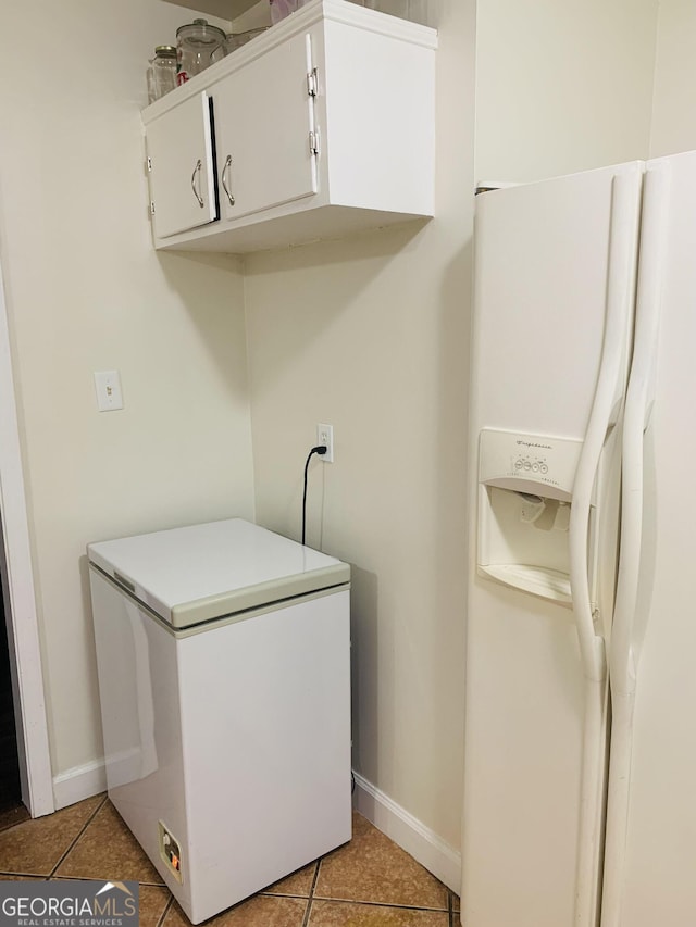 8524 Vining Way, Savannah, GA 31406 - washroom featuring light tile patterned floors and baseboards