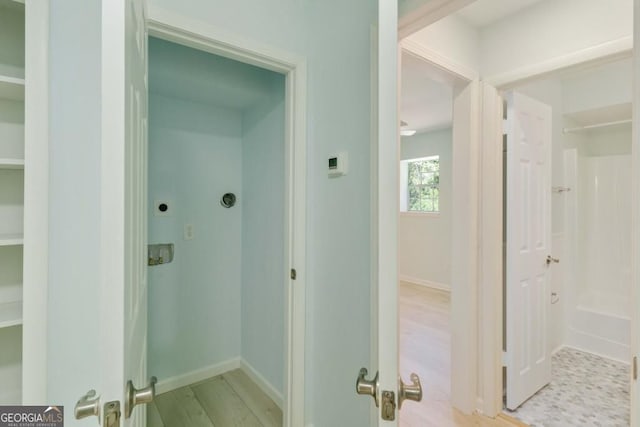 305 Stonecliff Ct, Stone Mountain, GA 30083 - hallway with baseboards and wood finished floors