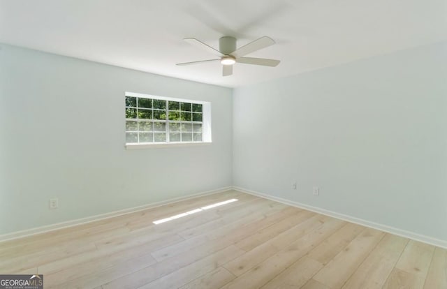 305 Stonecliff Ct, Stone Mountain, GA 30083 - spare room with a ceiling fan and wood finished floors