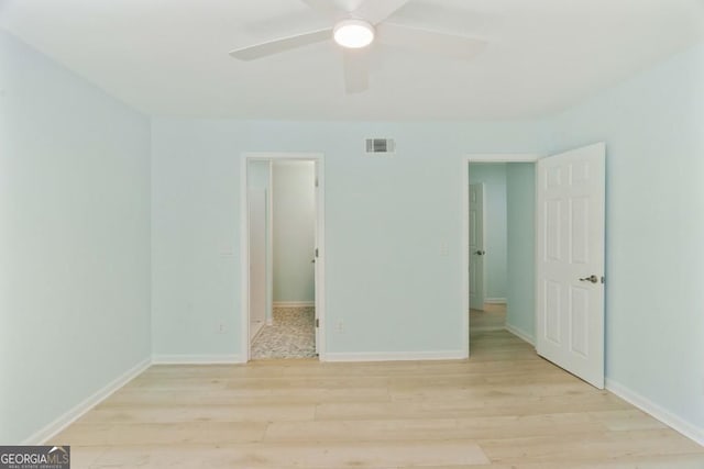 305 Stonecliff Ct, Stone Mountain, GA 30083 - spare room with light wood-style floors and ceiling fan