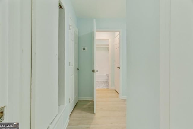 305 Stonecliff Ct, Stone Mountain, GA 30083 - corridor with light wood-type flooring and baseboards