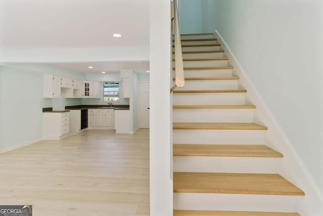 305 Stonecliff Ct, Stone Mountain, GA 30083 - stairs featuring wood finished floors and recessed lighting