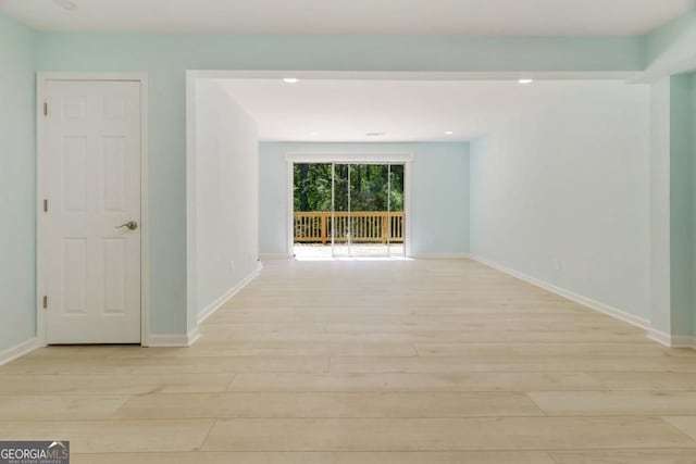 305 Stonecliff Ct, Stone Mountain, GA 30083 - empty room with light wood-type flooring and recessed lighting