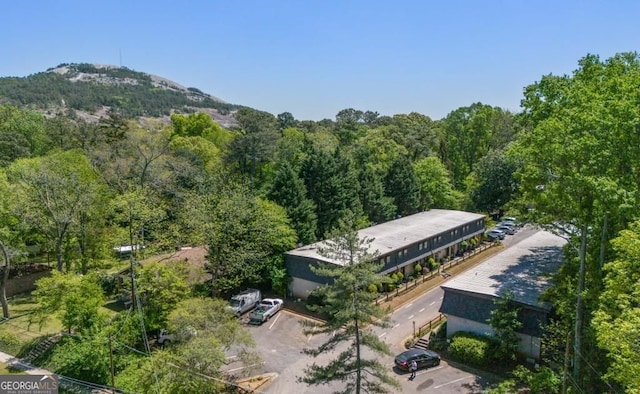 305 Stonecliff Ct, Stone Mountain, GA 30083 - aerial view of a forest and a mountain backdrop