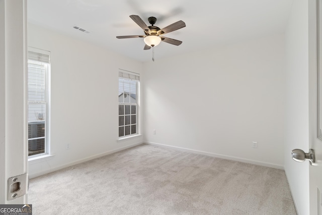 103 St Albans Way, Peachtree City, GA 30269 - carpeted spare room with baseboards, a ceiling fan, and visible vents
