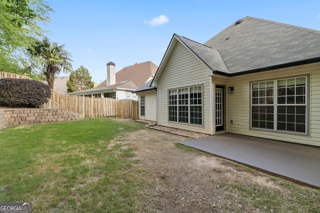 103 St Albans Way, Peachtree City, GA 30269 - back of house featuring a lawn, a patio, and fence