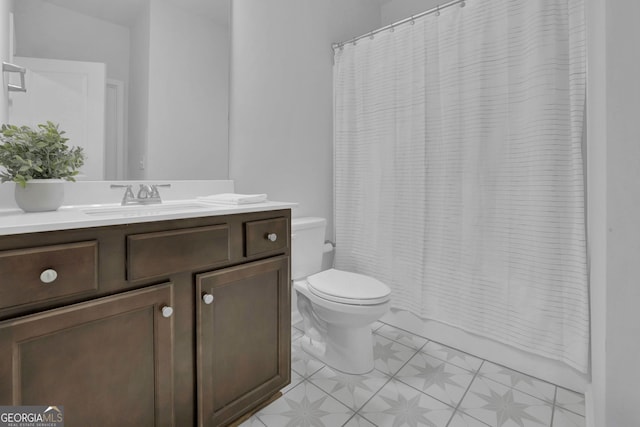 7108 Birch View Ct, Flowery Branch, GA 30542 - bathroom featuring vanity and toilet