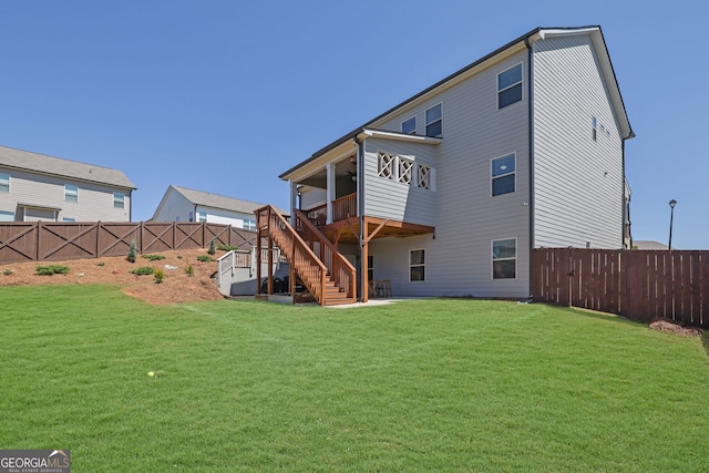 7108 Birch View Ct, Flowery Branch, GA 30542 - rear view of house with stairs, a fenced backyard, a ceiling fan, a patio, and a wooden deck