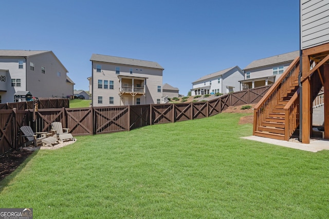 7108 Birch View Ct, Flowery Branch, GA 30542 - fenced backyard featuring a residential view and stairway