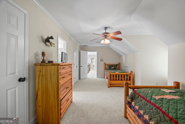 bedroom featuring lofted ceiling, crown molding, ceiling fan, and light carpet