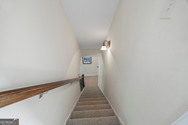 stairway with baseboards