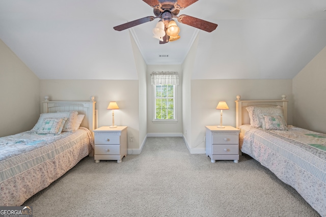 bedroom with carpet flooring, baseboards, visible vents, lofted ceiling, and a ceiling fan