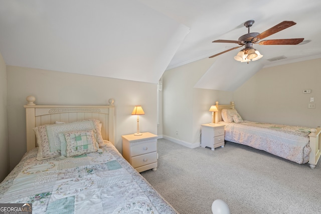 carpeted bedroom with vaulted ceiling, a ceiling fan, visible vents, and baseboards