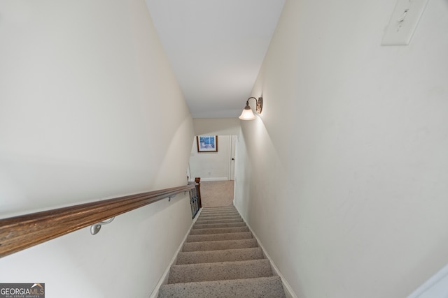 stairway with baseboards