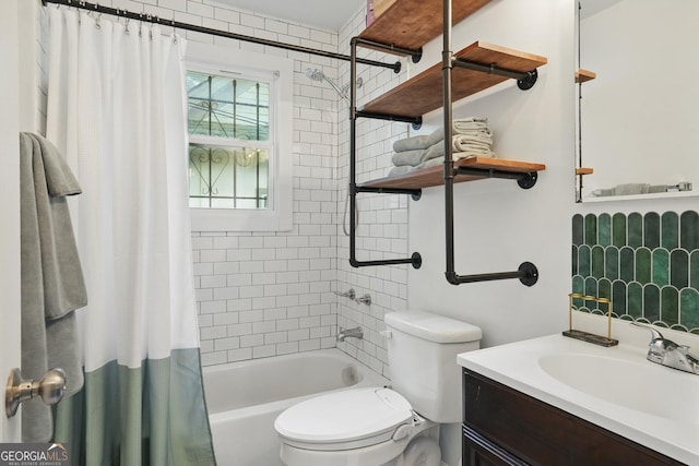 bathroom featuring vanity, shower / tub combo, and toilet