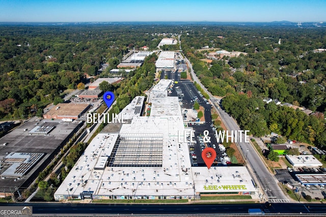 bird's eye view featuring a view of trees