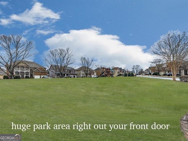view of yard featuring a residential view