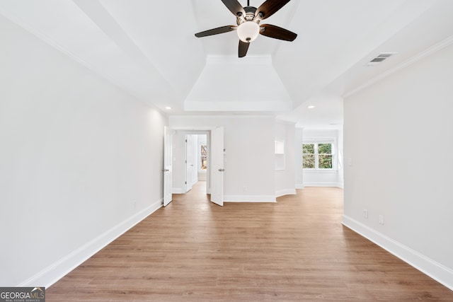 unfurnished living room with recessed lighting, visible vents, a ceiling fan, light wood-style floors, and baseboards