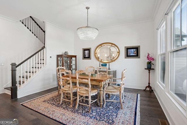 2004 Cortland Rd, Milton, GA 30009 - dining area with wood finished floors, visible vents, crown molding, baseboards, and a notable chandelier