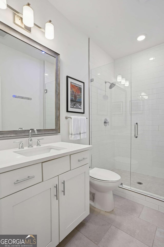 2004 Cortland Rd, Milton, GA 30009 - full bath with a shower stall, toilet, vanity, and recessed lighting