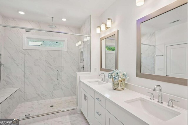 2004 Cortland Rd, Milton, GA 30009 - bathroom featuring double vanity, a shower stall, and a sink