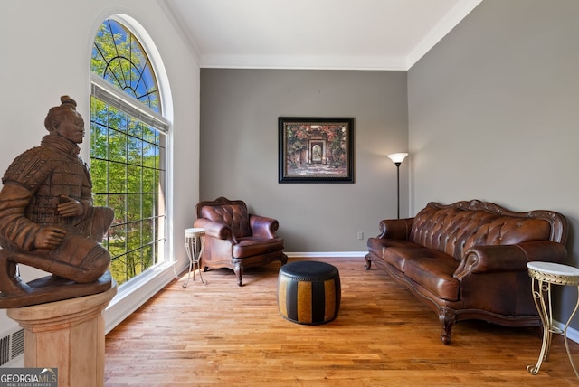 1820 Lyon Ave SW, Atlanta, GA 30331 - living area with wood finished floors, healthy amount of natural light, and crown molding