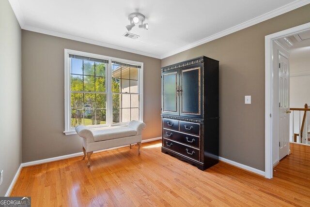 1820 Lyon Ave SW, Atlanta, GA 30331 - sitting room with light wood-style floors and crown molding