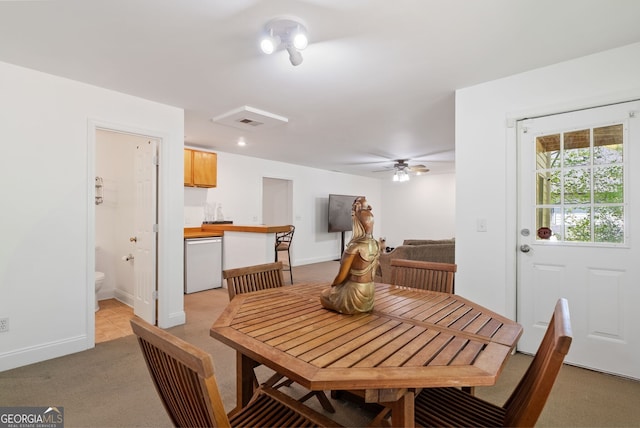 1820 Lyon Ave SW, Atlanta, GA 30331 - dining area with light colored carpet and ceiling fan