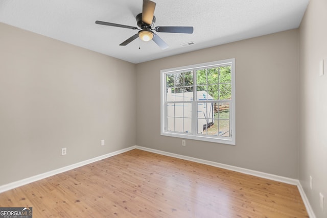 120 Hidden Brook Trl, Newnan, GA 30265 - unfurnished room with light wood-style flooring and ceiling fan