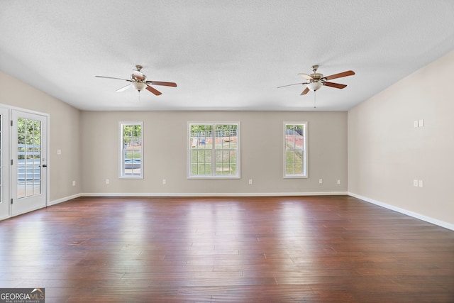 120 Hidden Brook Trl, Newnan, GA 30265 - empty room with ceiling fan, a textured ceiling, and dark wood finished floors