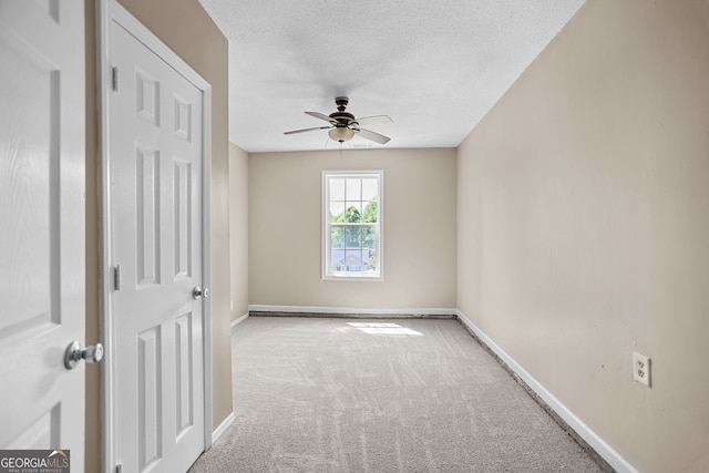 120 Hidden Brook Trl, Newnan, GA 30265 - carpeted empty room featuring a ceiling fan and a textured ceiling