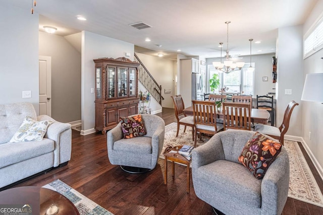 living room featuring stairway, dark wood finished floors, plenty of natural light, and recessed lighting