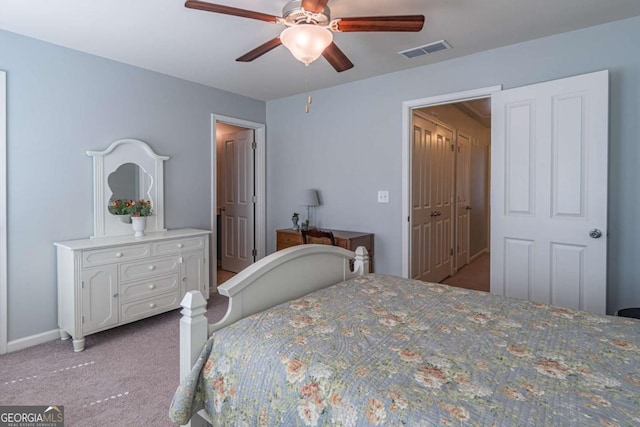 bedroom featuring carpet flooring, a ceiling fan, and baseboards