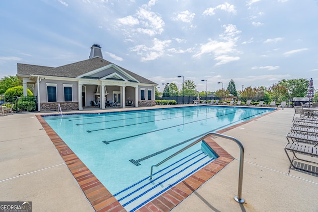 4236 Tacoma Trce, Suwanee, GA 30024 - community pool featuring a patio area