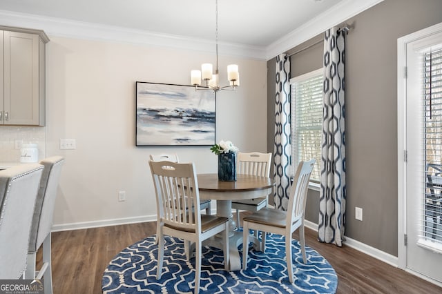 113 Silver Leaf Trce, Douglasville, GA 30134 - dining space featuring wood finished floors, ornamental molding, baseboards, and a notable chandelier