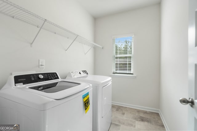 113 Silver Leaf Trce, Douglasville, GA 30134 - washroom featuring independent washer and dryer, baseboards, and laundry area
