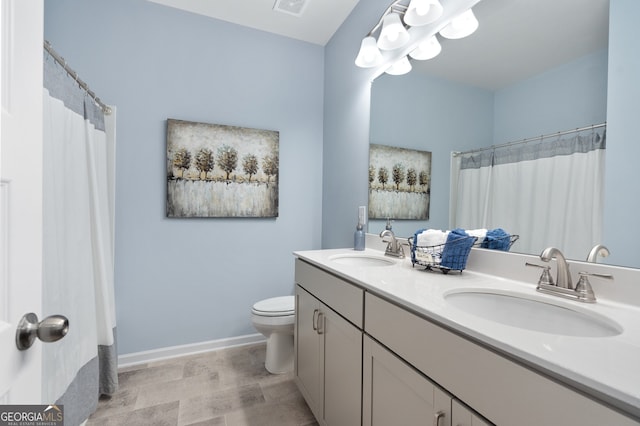 113 Silver Leaf Trce, Douglasville, GA 30134 - full bathroom featuring visible vents, a sink, double vanity, and toilet