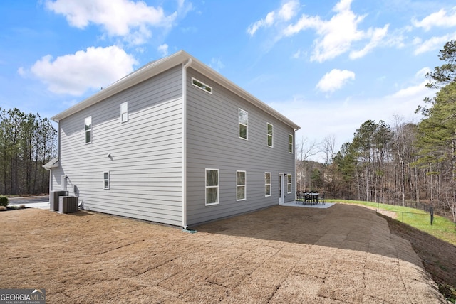 113 Silver Leaf Trce, Douglasville, GA 30134 - rear view of house with a patio area and central AC